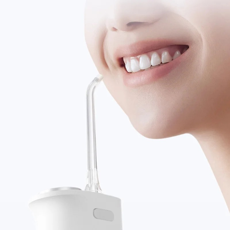 หัวฉีดน้ำทำความสะอาดช่องปากแบบ - Oral Irrigator Flosser บทวิจารณ์และราคา